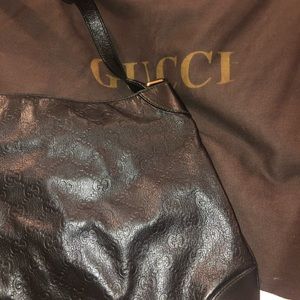 a black gucci bag